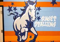  Sunset stallions mural in the hallway of a horse